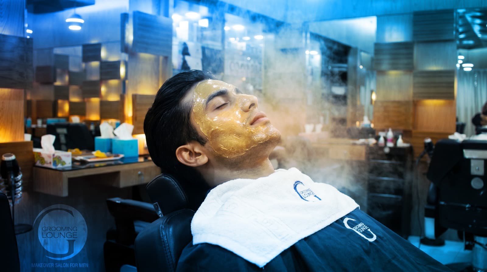 Man sitting in barber chair
